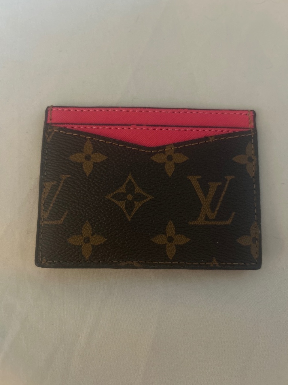 Magenta and brown LV card holder